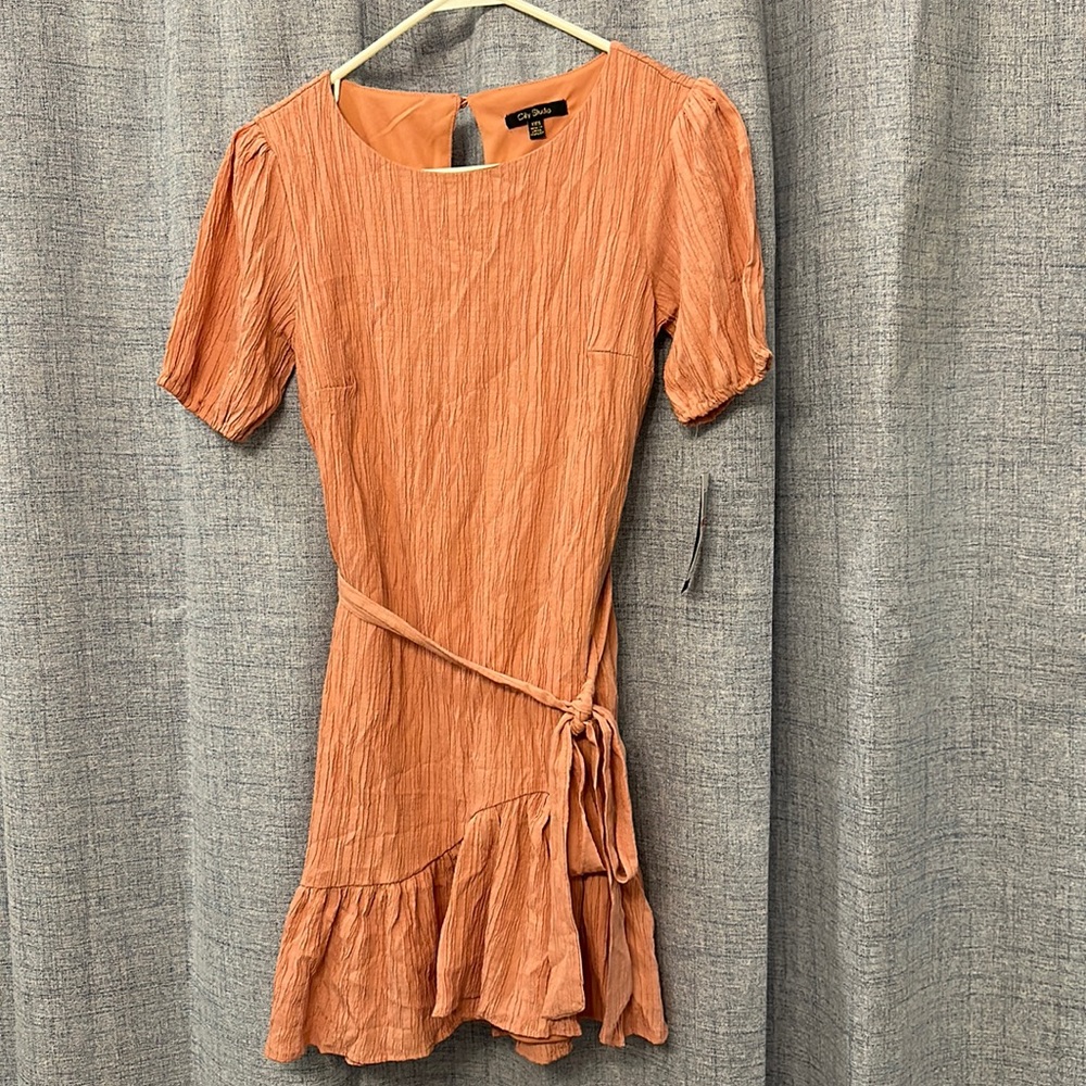 Pink size XXS macys dress super cute it’s a soft pink cocktail style dress